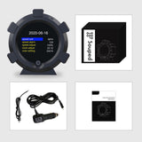 A modern black digital gauge with a charger and cable.