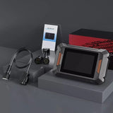 DPF regen and diagnostic scanner package featuring a car diagnostic tool resting on a box.