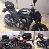 Side view of a motorcycle with a luggage rack and a waterproof tail bag attached to the back.